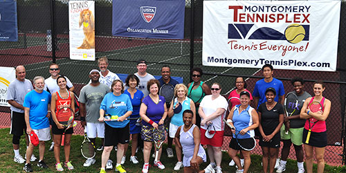 photo montgomery tennisplex with adults and montgomery tennisplex banner